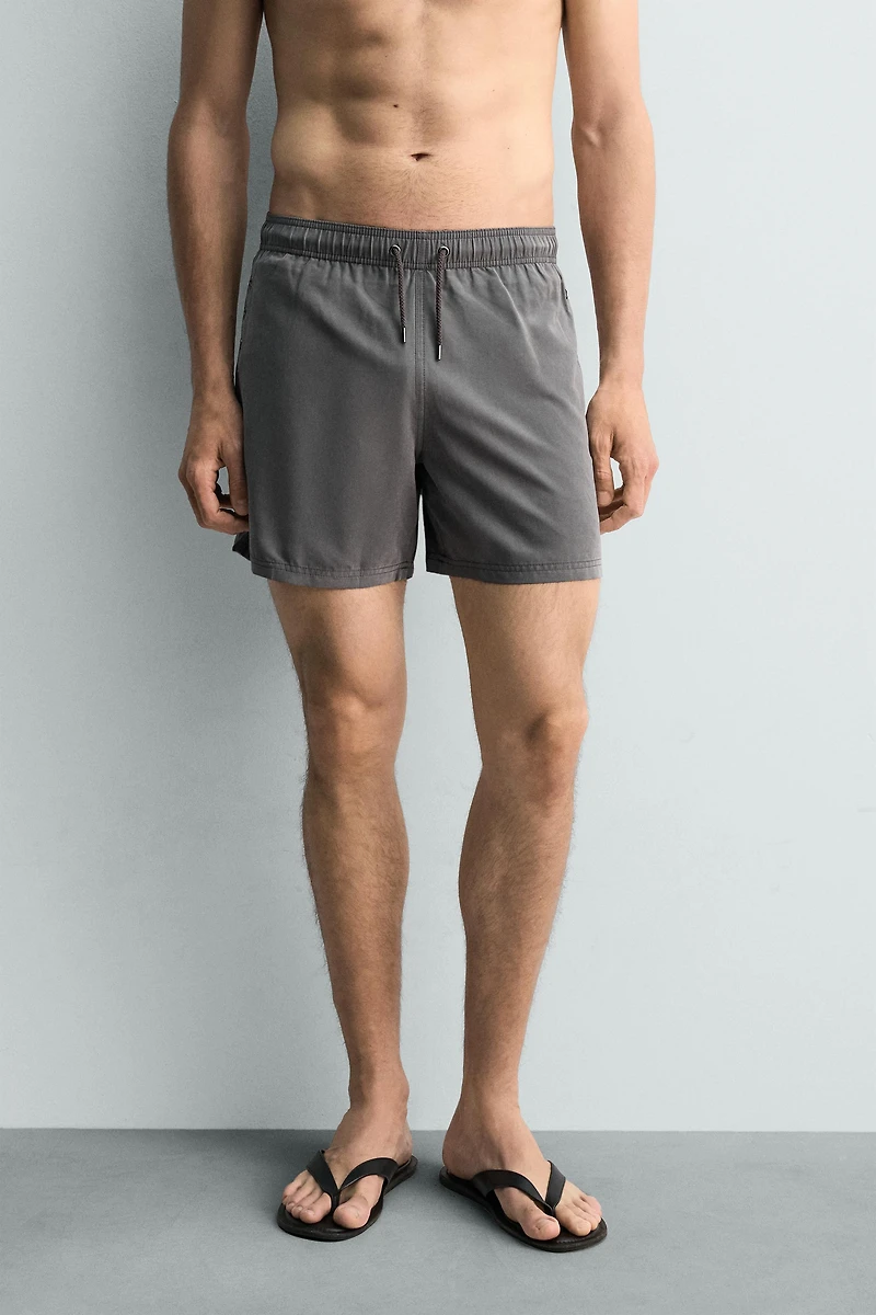 METALLIC EYELET SWIMSUIT