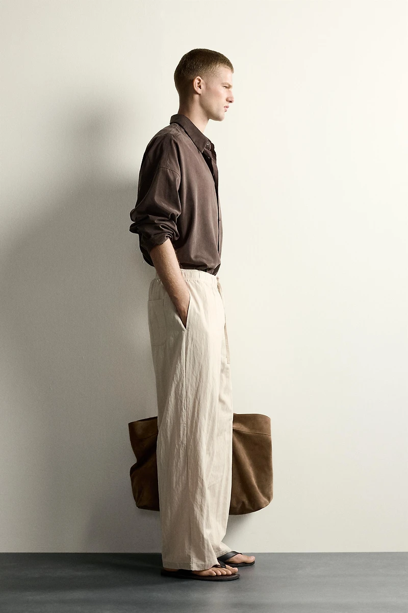 CRINKLED EFFECT TECHNICAL RELAXED FIT PANTS