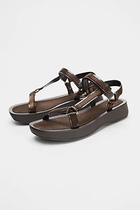STRAPPY ADHESIVE SANDALS