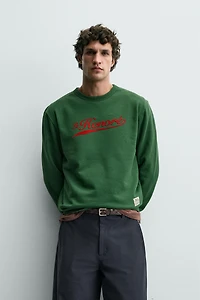 COMBINATION PRINT SWEATSHIRT