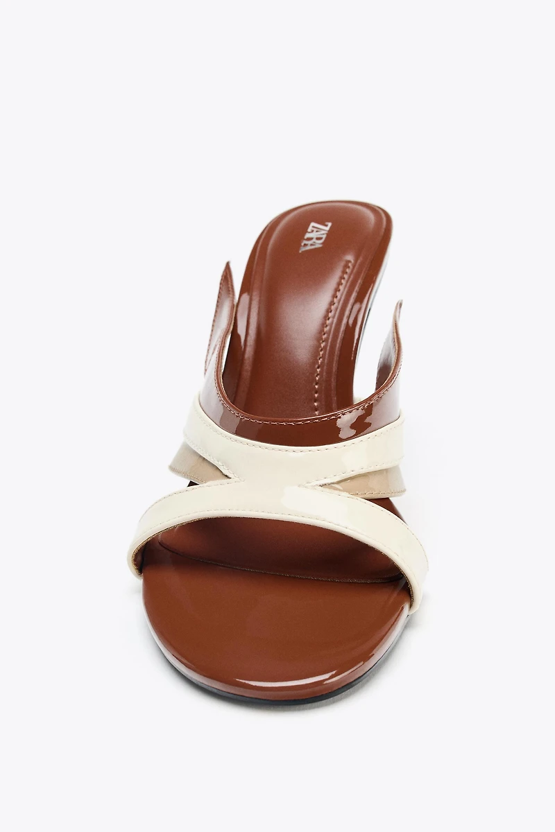 ASYMMETRIC HEELED SANDALS