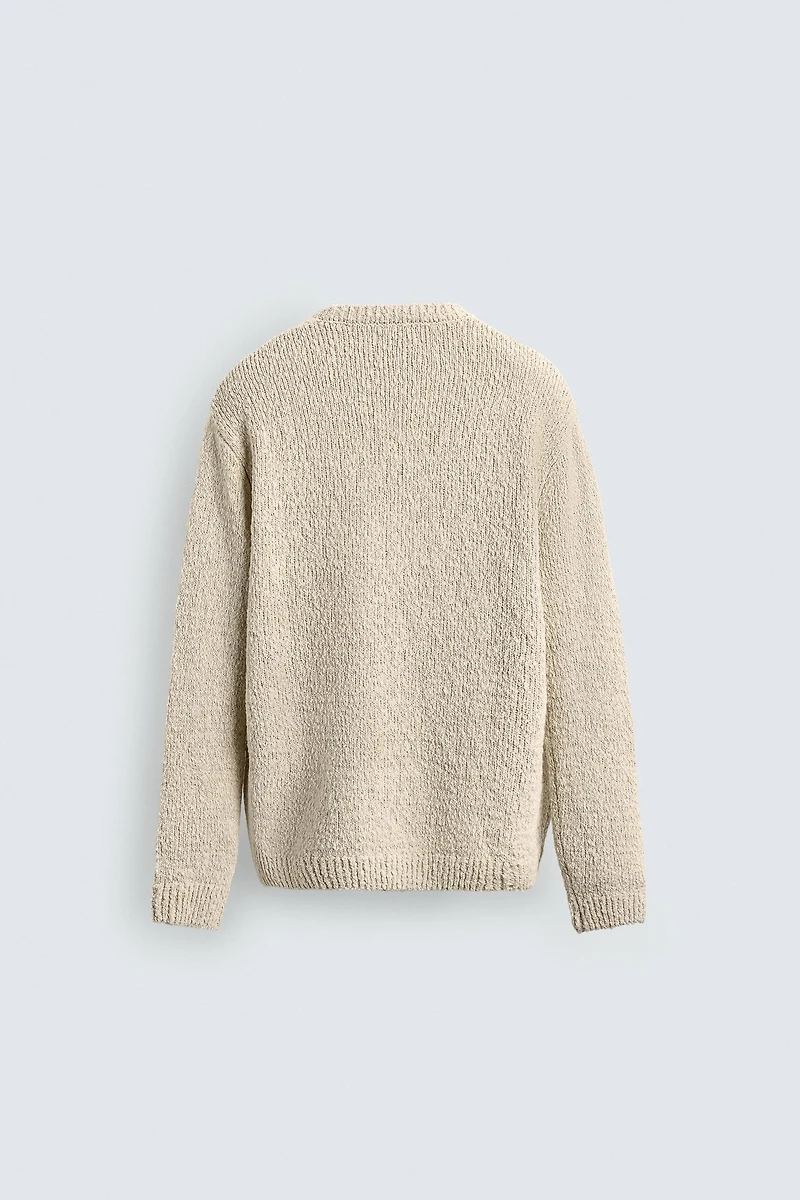 IRREGULAR TEXTURED JUMPER