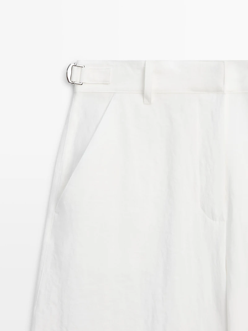 Flowing trousers with buckles