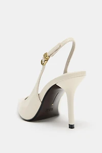 EMBOSSED SLINGBACK HEELS