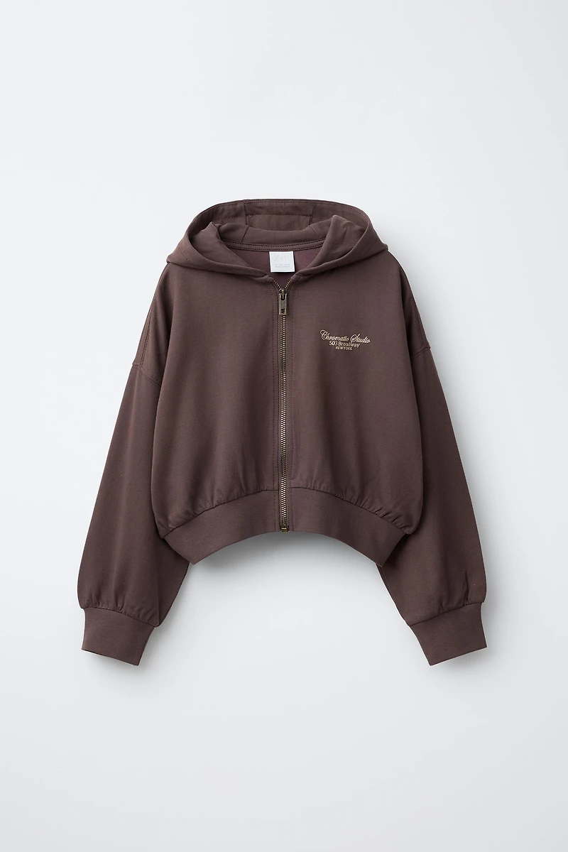 RAISED TEXT HOODIE