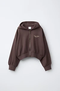 RAISED TEXT HOODIE