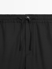 Relaxed fit 100% wool trousers