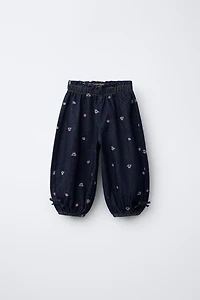 EMBROIDERED FLORAL BALLOON JEANS