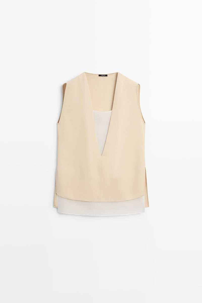 Flowing double-layer top with contrast detail