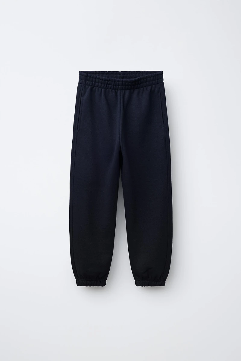 LOT DE DEUX PANTALONS JOGGING EN MOLLETON