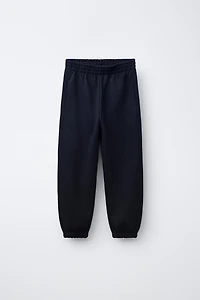 LOT DE DEUX PANTALONS JOGGING EN MOLLETON
