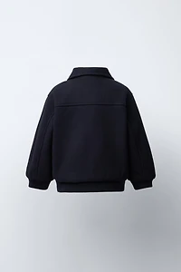 VESTE EN LAINE À POCHES