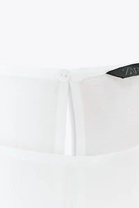 SEMI-SHEER RUFFLED BLOUSE