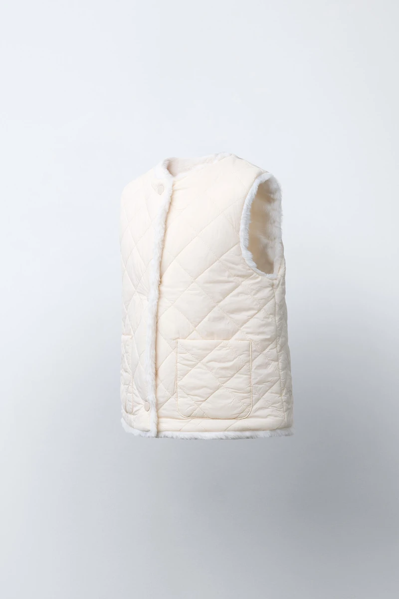 REVERSIBLE FAUX FUR VEST