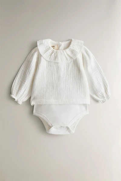 MUSLIN BABY BODYSUIT