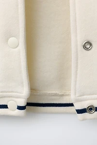 SNOOPY PEANUTS™ PLUSH BOMBER JACKET