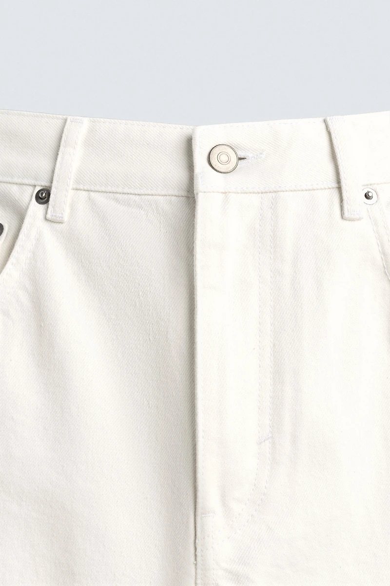 IRREGULAR HEM STRAIGHT FIT JEANS