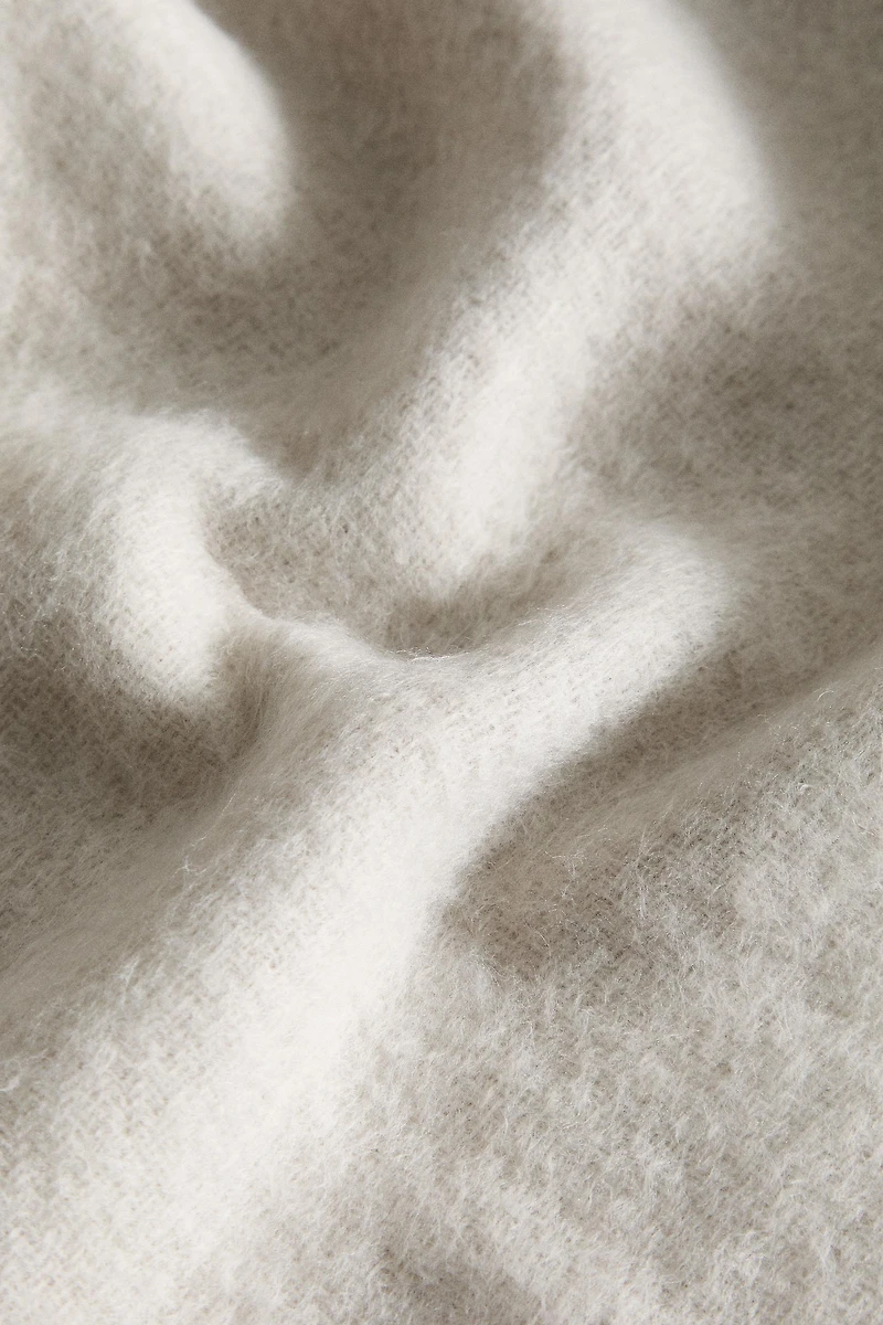 PLAID DOUX À FRANGES