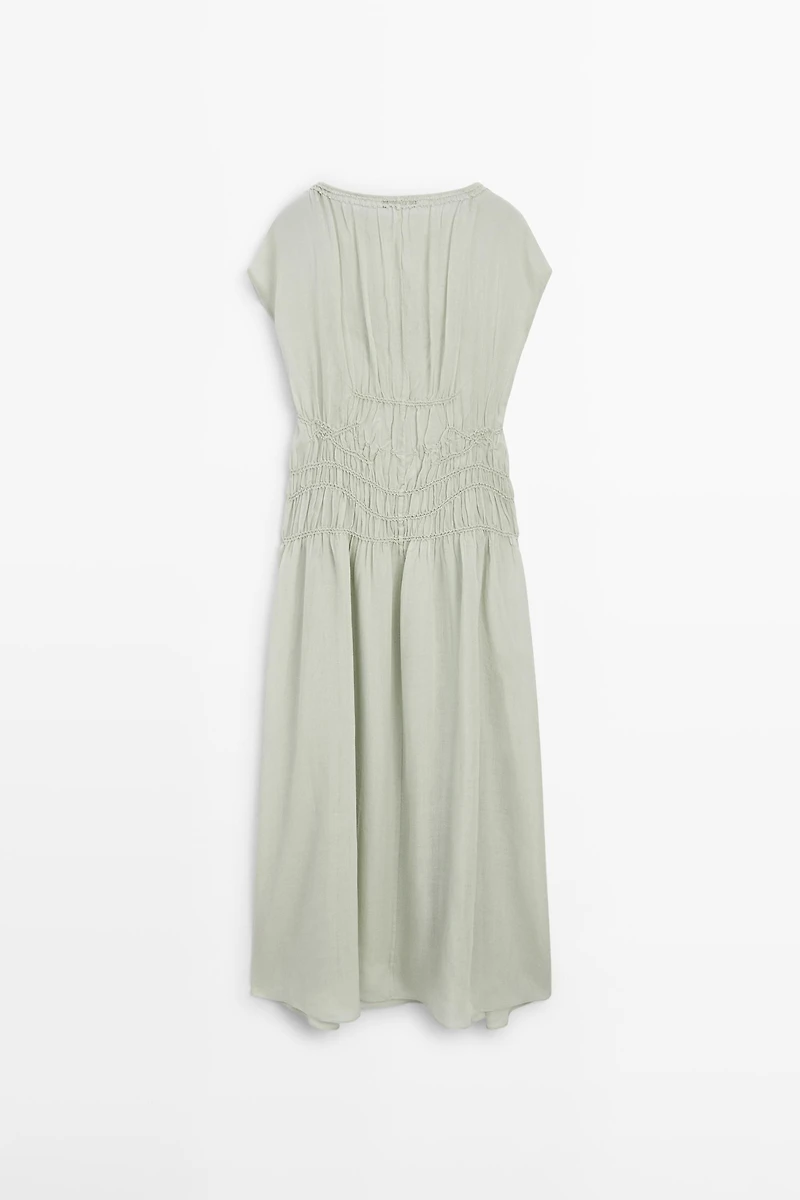Long flowing dress with embroidered details