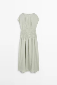 Long flowing dress with embroidered details