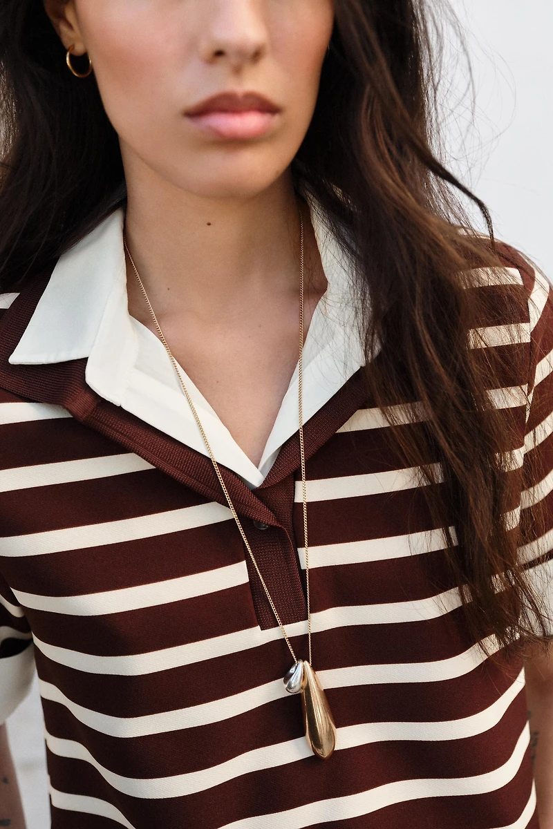 STRIPED COMBO POLO TOP