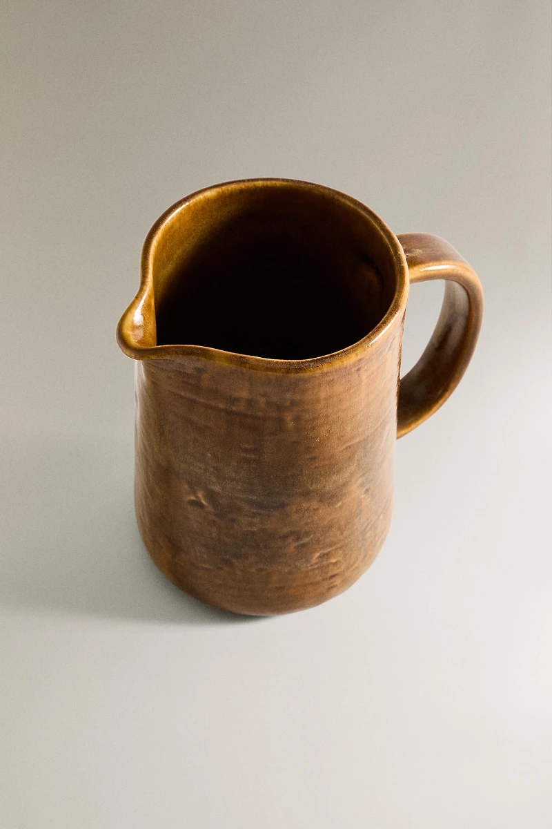 BROWN STONEWARE PITCHER
