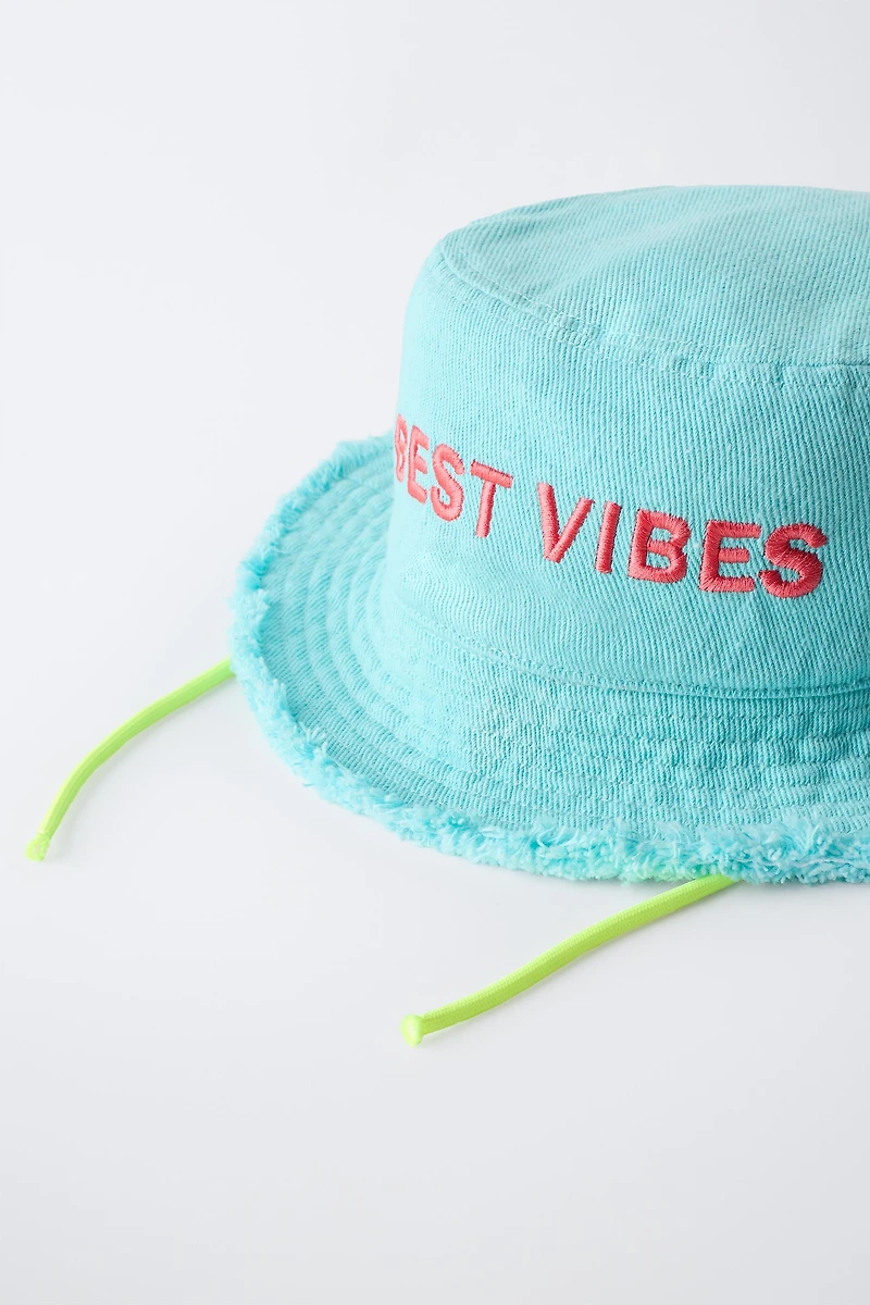EMBROIDERED TEXT BUCKET HAT