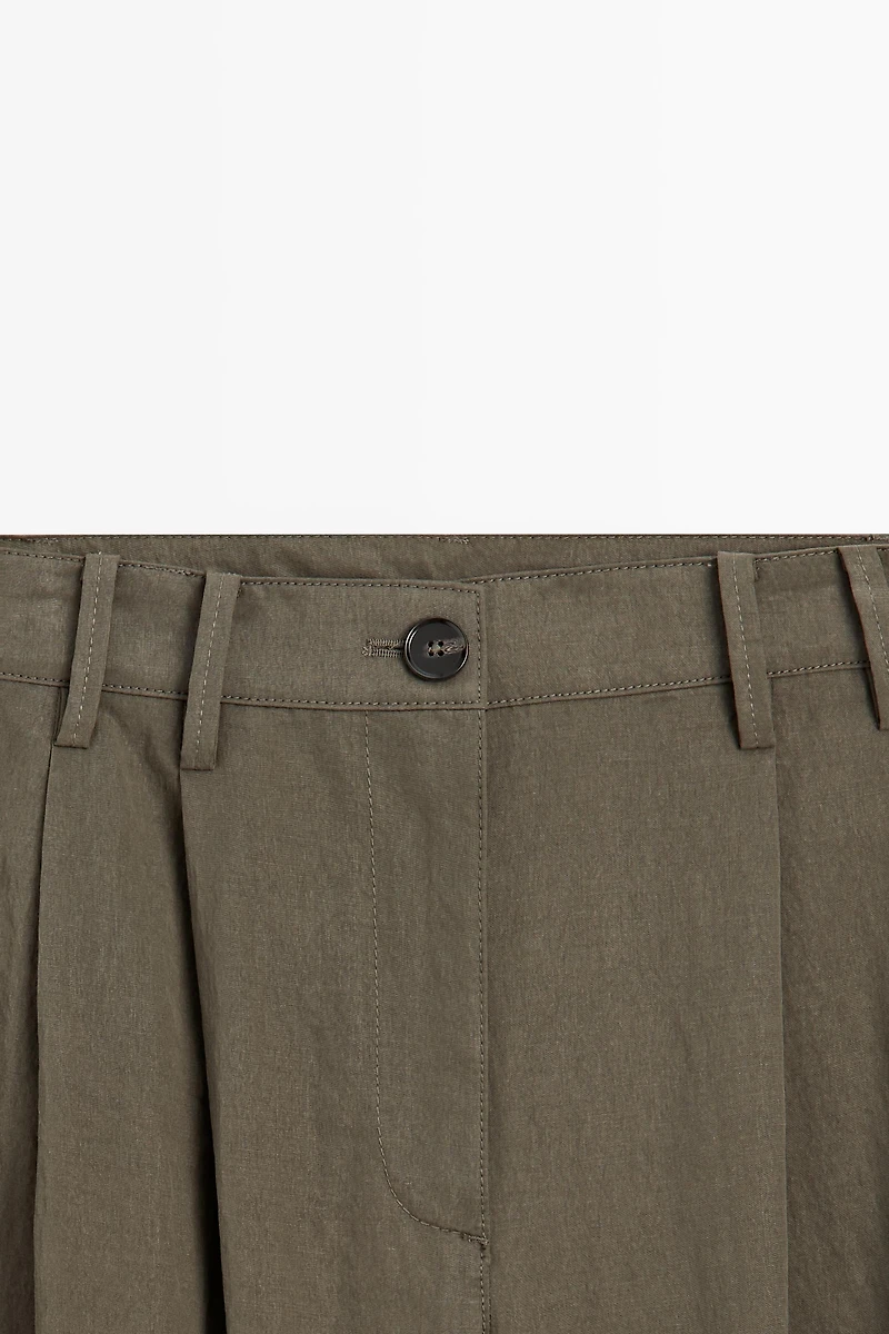 Technical wide-leg pleated pants
