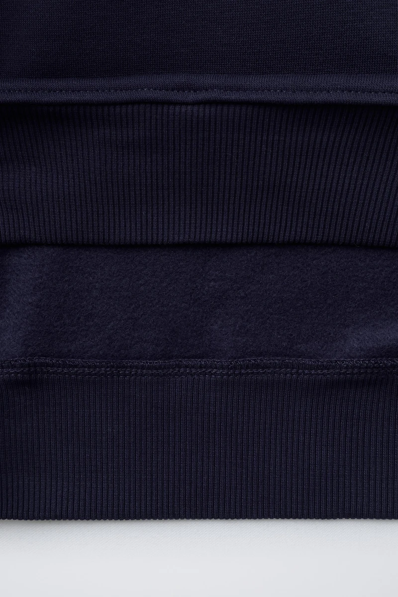 SWEAT À INSCRIPTION BRODÉE