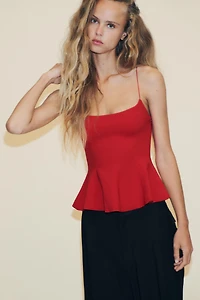 STRETCH PEPLUM TOP