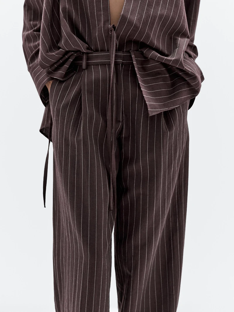 Darted pinstripe trousers