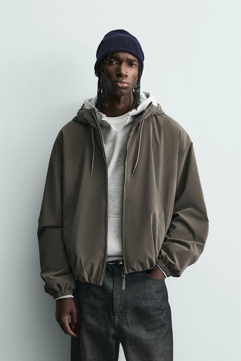 LIGHTWEIGHT HOODED TECHNICAL JACKET