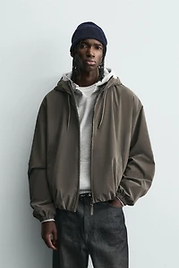 LIGHTWEIGHT HOODED TECHNICAL JACKET
