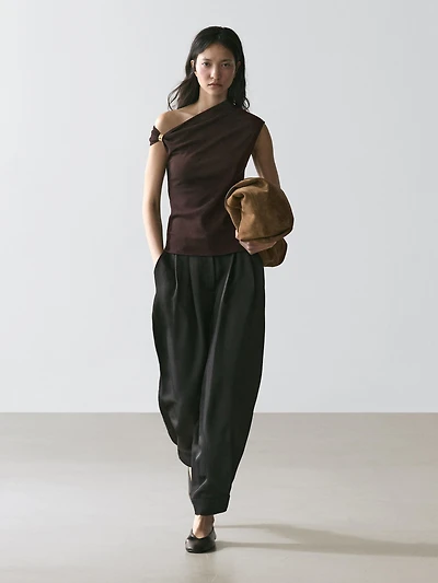 Asymmetric top with brooch detail
