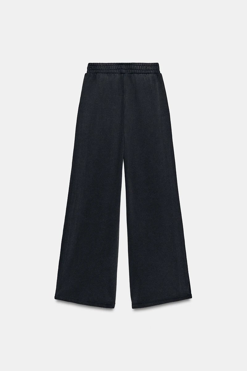WASHED EFFECT FLEECE PANTS WITH STUDS