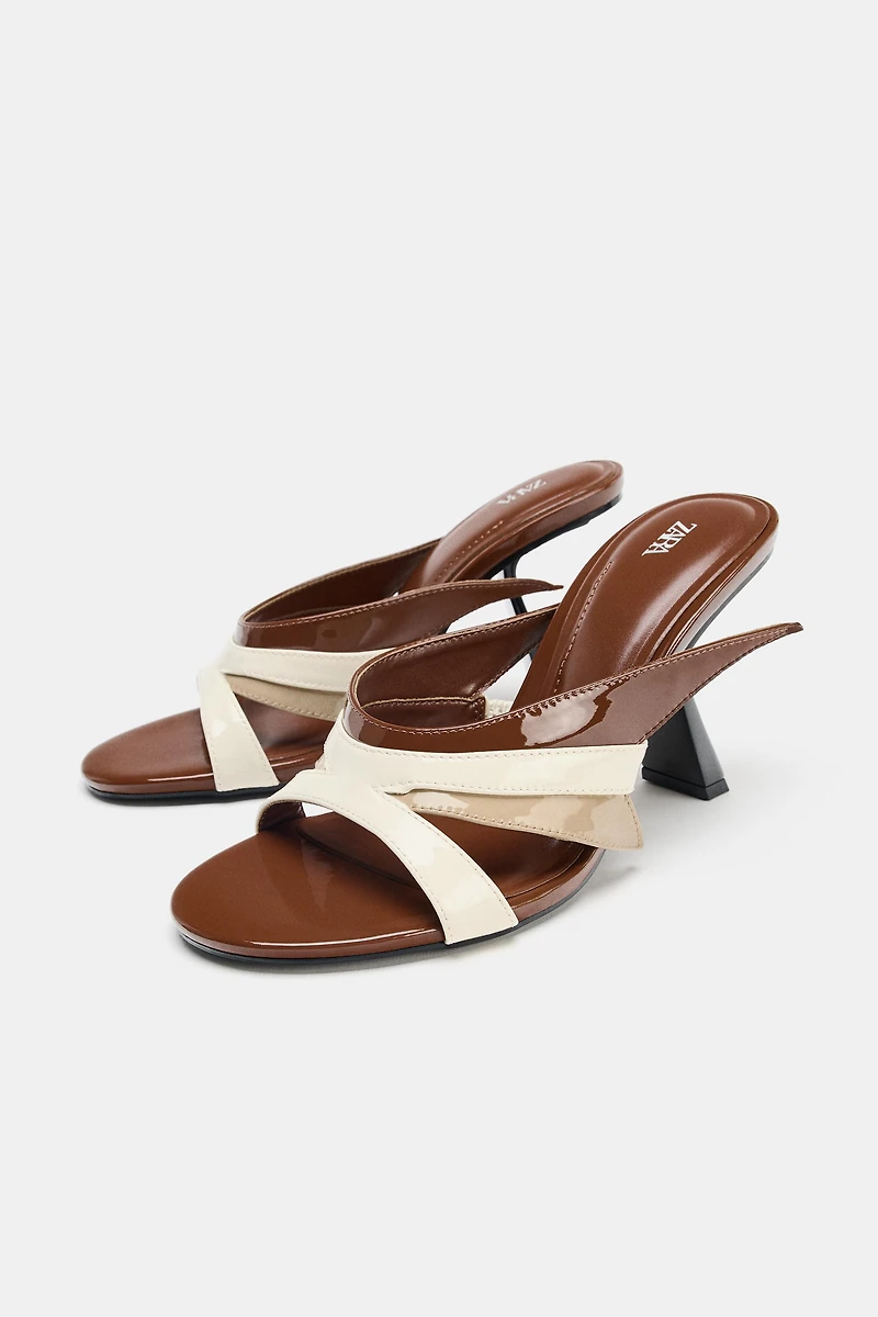 ASYMMETRIC HEELED SANDALS