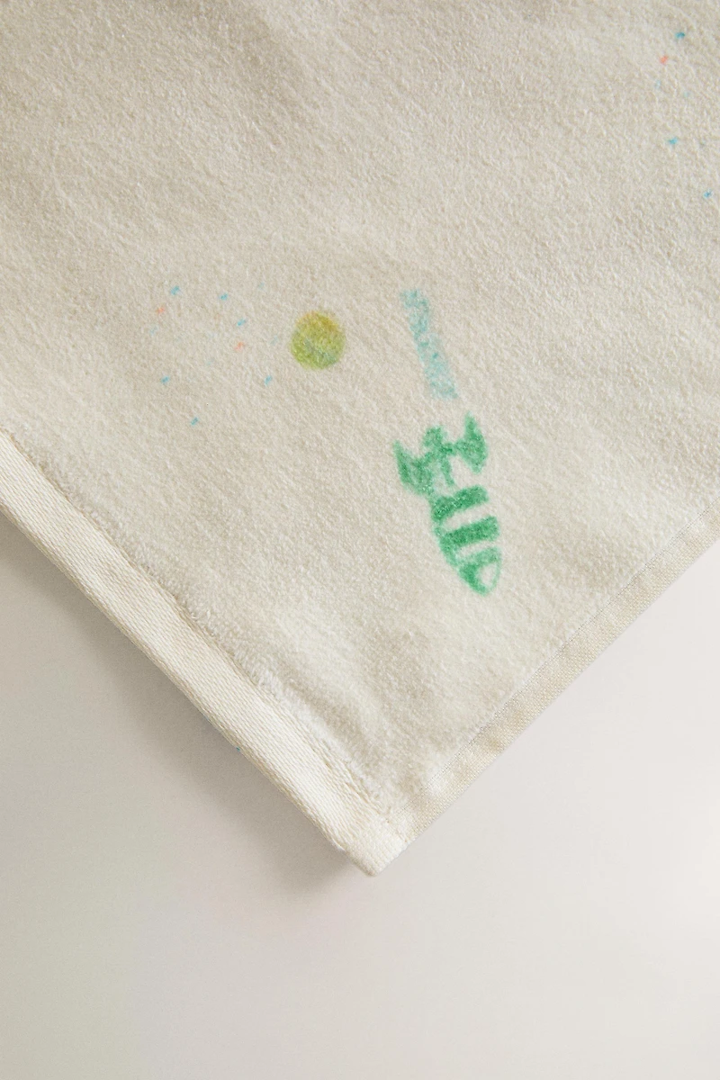 KIDS' PLANET BATH TOWEL