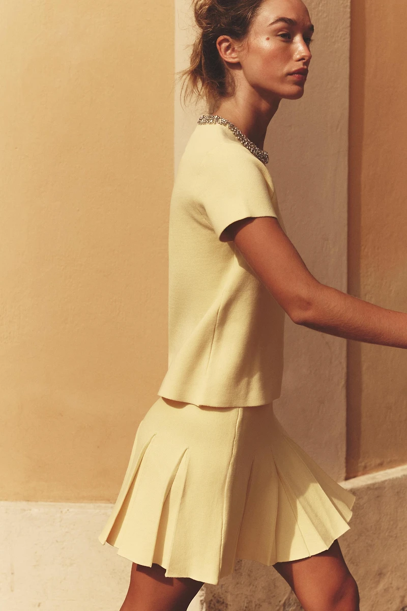 BOX PLEAT KNIT MINI SKIRT