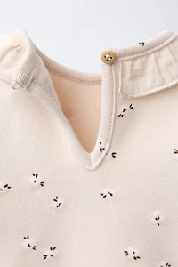 WARM FLORAL BODYSUIT