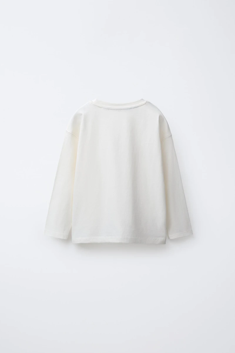 T-SHIRT BRODÉ SNOOPY PEANUTS™