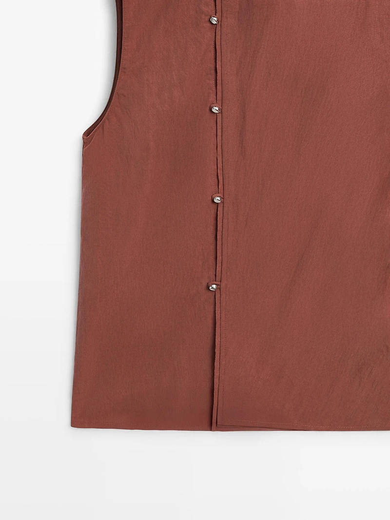 Blouse boutonnage côté argenté