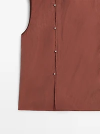 Blouse boutonnage côté argenté