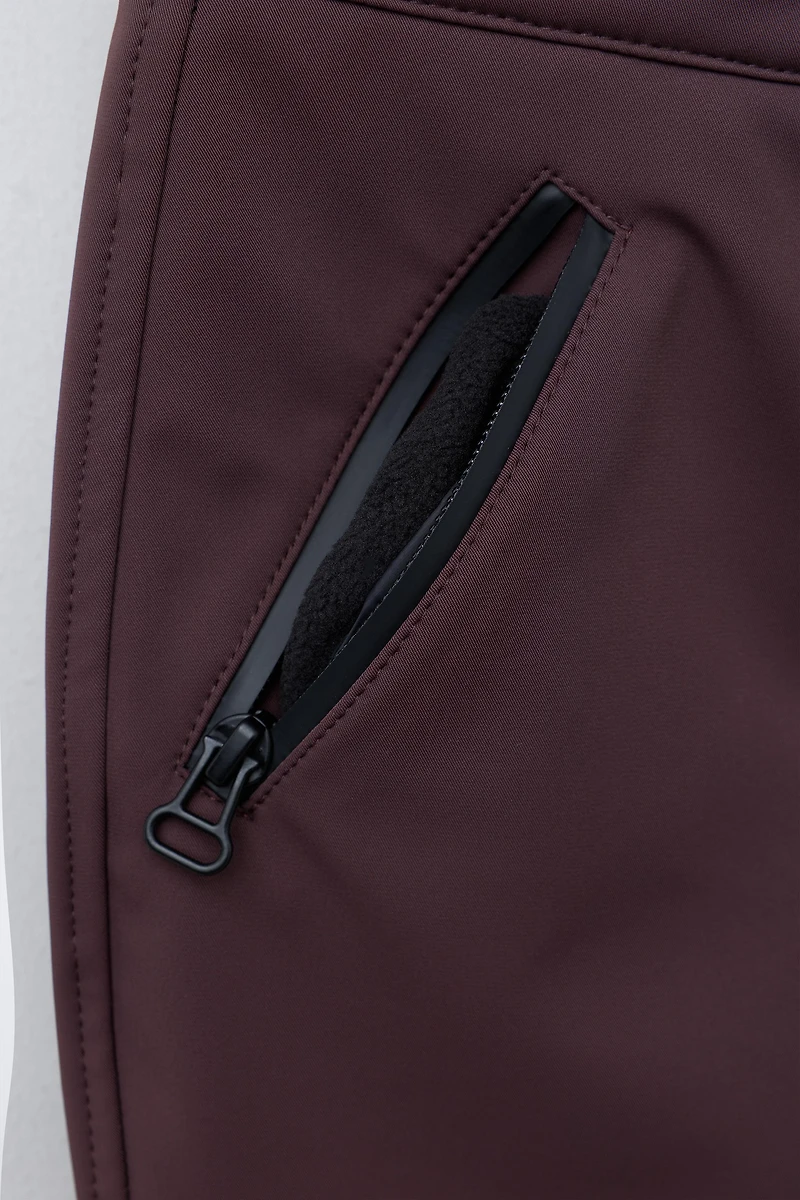 WATER-RESISTANT AND WINDPROOF PANTS RECCO® SYSTEM SKI COLLECTION