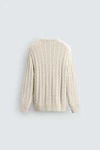 TEXTURED WOVEN SWEATER