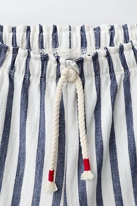 WOVEN STRIPED RUFFLE PANTS