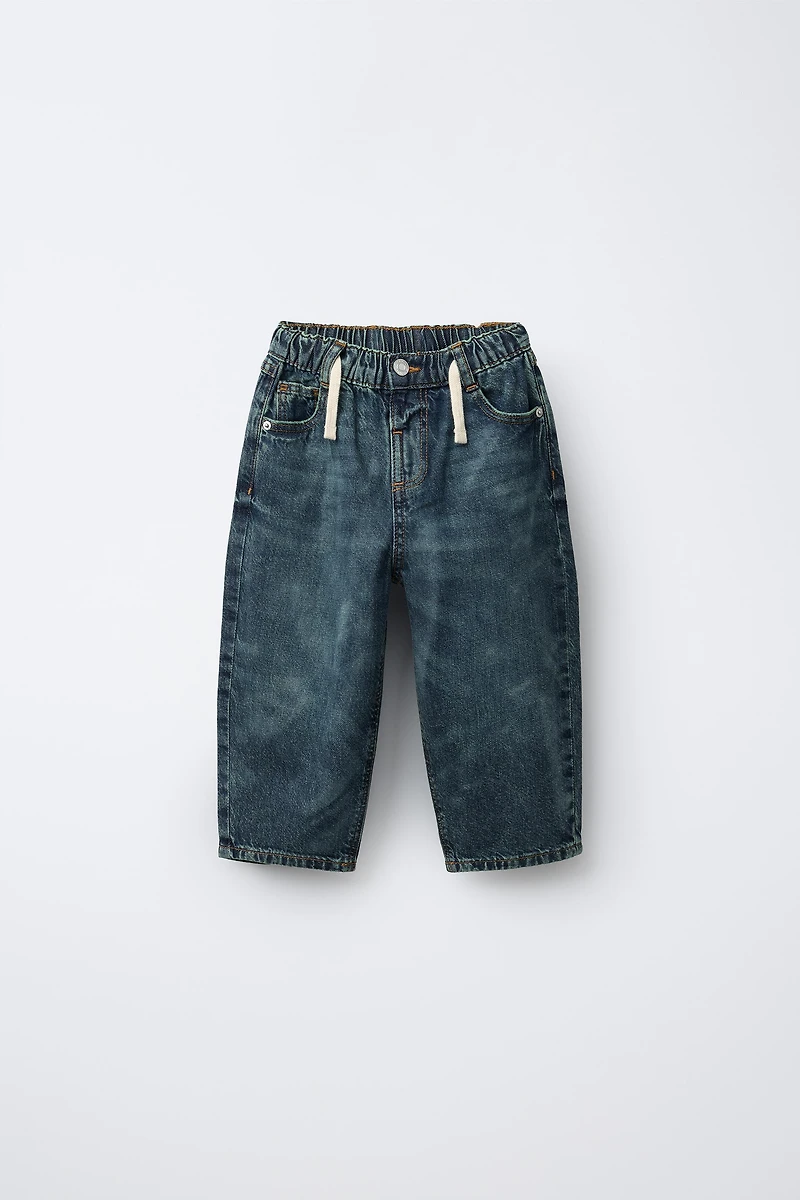 DISTRESSED BALLOON JEANS