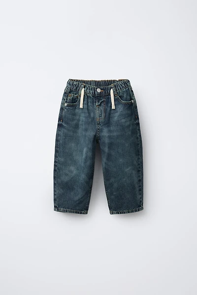 DISTRESSED BALLOON JEANS