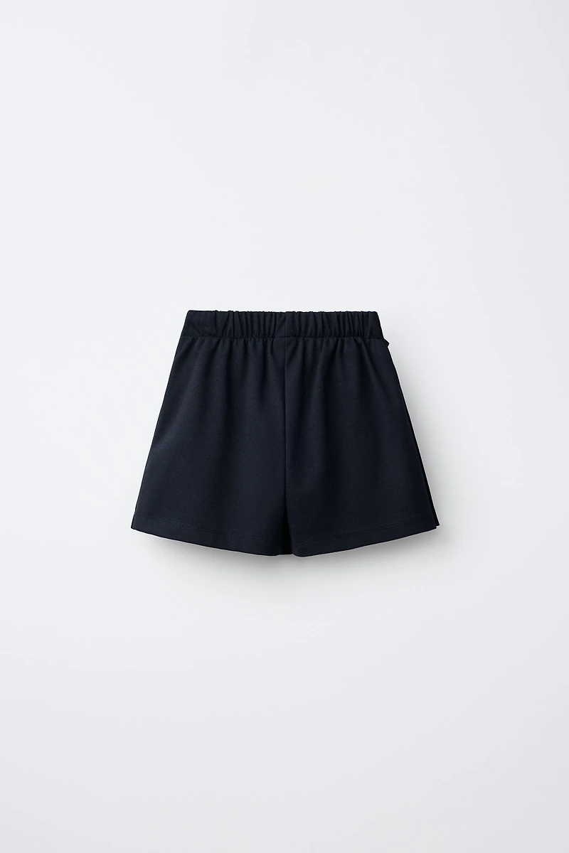 BUCKLE DETAIL SKORT