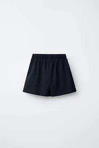 BUCKLE DETAIL SKORT