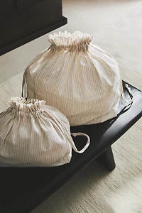 STRIPED BAG WITH DRAWSTRING CLOSURE